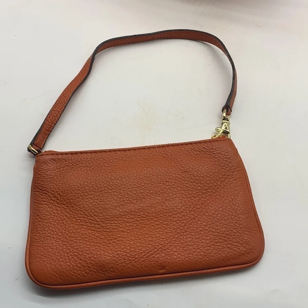 Michael Michael Kors Orange Gold Wristlet. SM1714